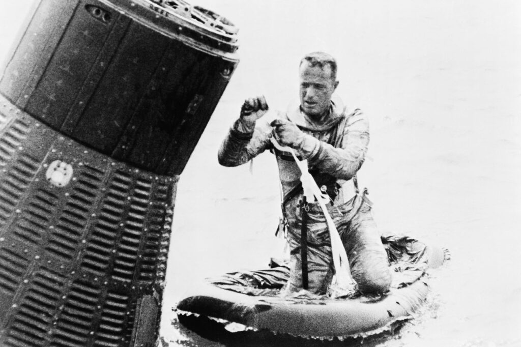 Astronaut Scott Carpenter, prime pilot for the Mercury-Atlas 7 mission, goes through a water egress training session